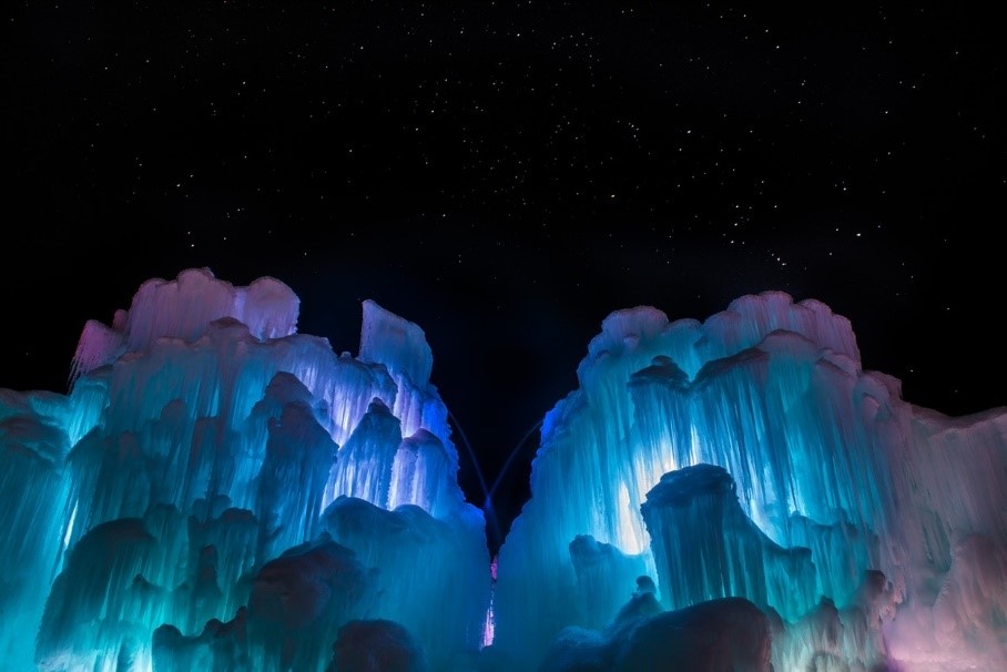 Ice Castle exhibit consisting of ice and colorful LED lights