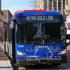 Metro Gold Line bus at a stop.